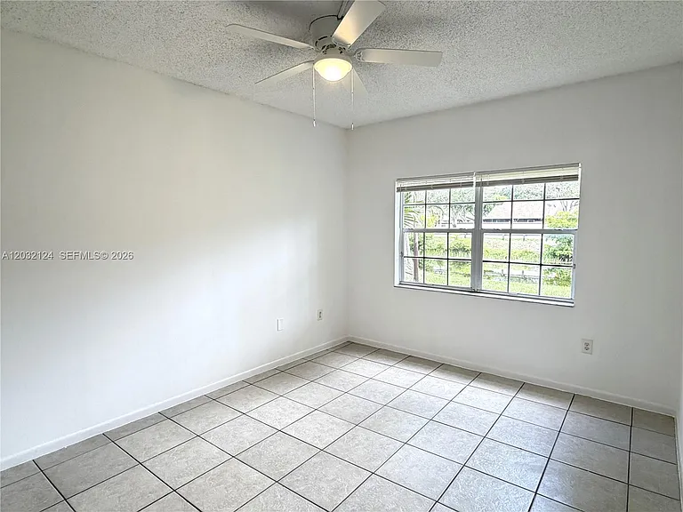 1701 NW 96th Ter #1J — Photo 8