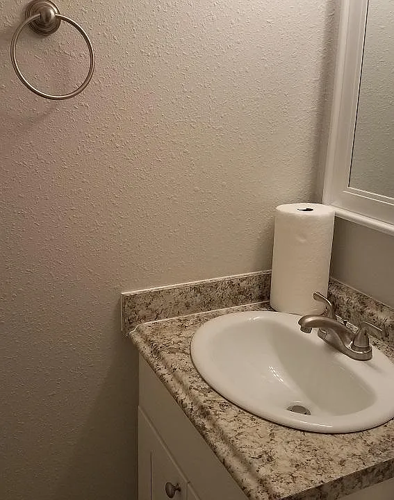 Bathroom has all new fixtures, single vanity with granite counter top, bathtub/shower, toilet. Small, but functional.