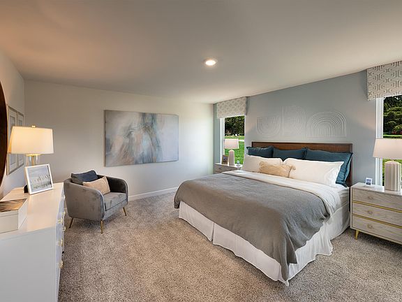 The primary suite offers a peaceful retreat at the end of the day.