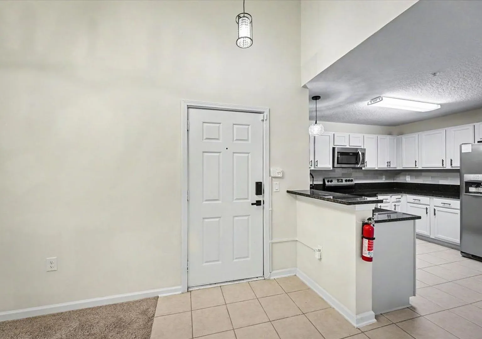 Spacious Updated 3BR/2BA Condo with Modern Finishes & Private Balcony — Photo 3