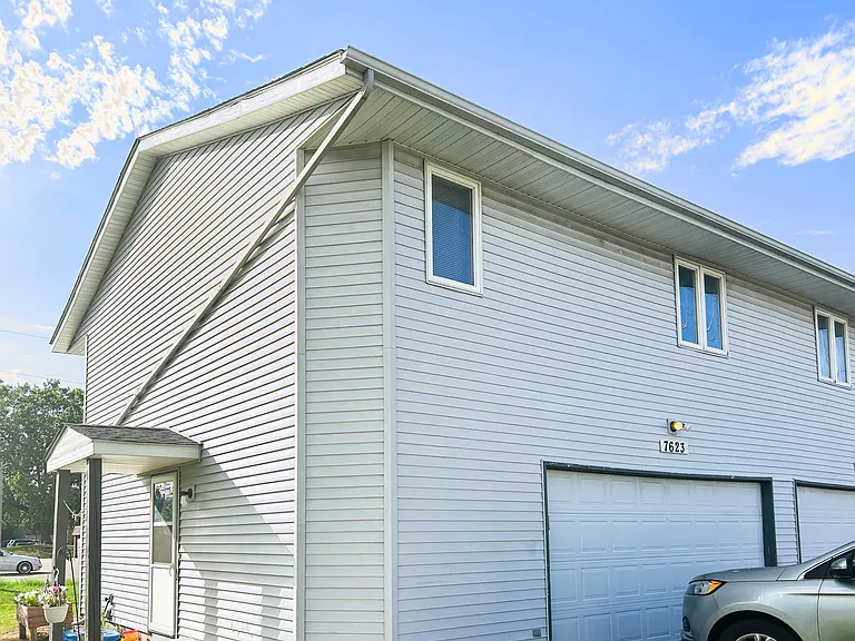 2 Car Attached Garage and Main Entry