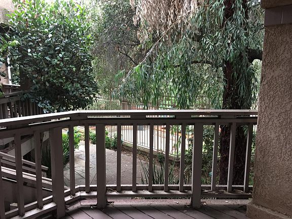 Patio with view of pool