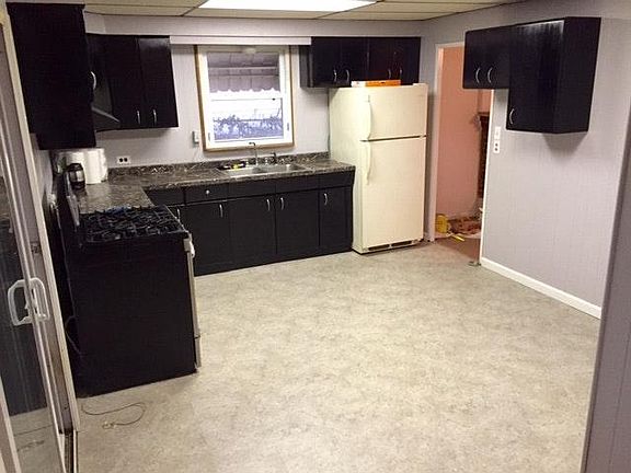 Kitchen features newer easy maintenance floating flooring
