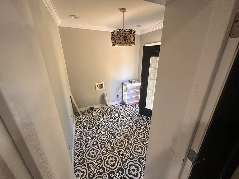 Laundry room heading out to back yard