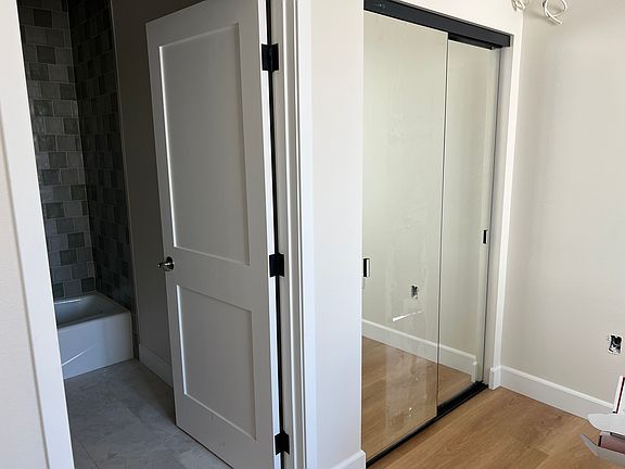 Bedroom 1 and Mirrored Closet