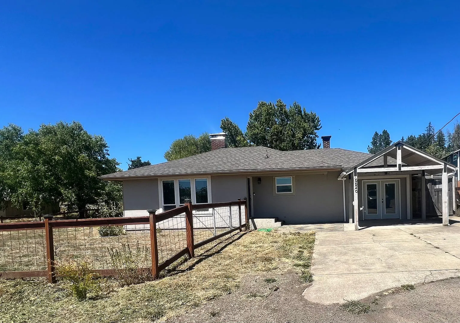 Charming Rural Retreat with Shop, Detached Office & Fenced Yard Just Minutes from Town! — Photo 1