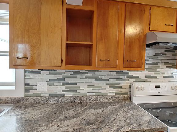 Kitchen with view of the back yard