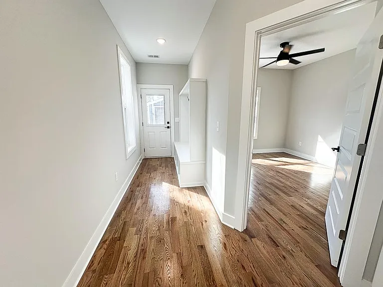 Downstairs back door and built in lockers