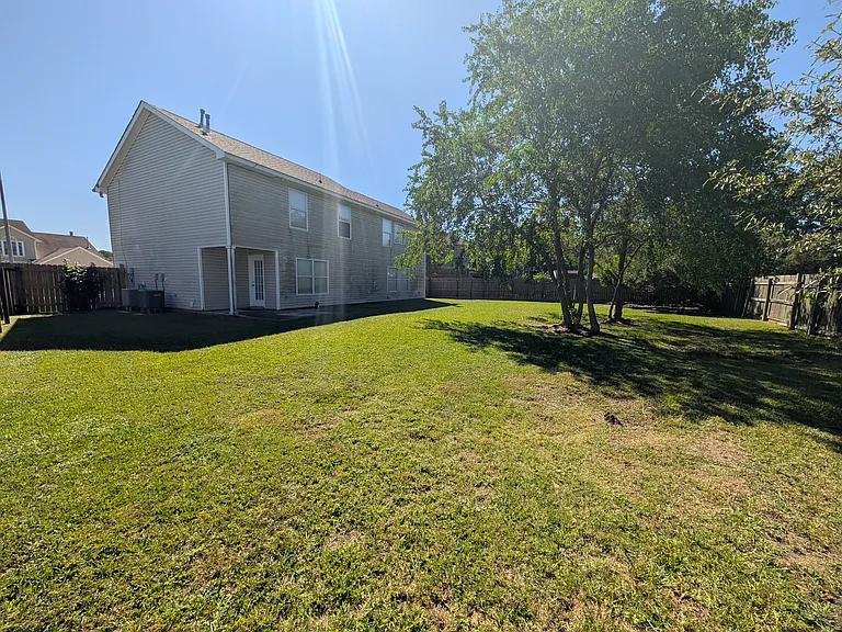Backyard with house in view