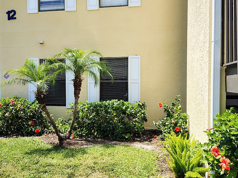 Front of first floor unit - view from parking space.