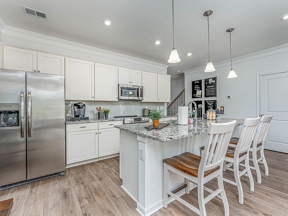 Pictures are from Braselton 2 furnished model home from a different community. Options and other d