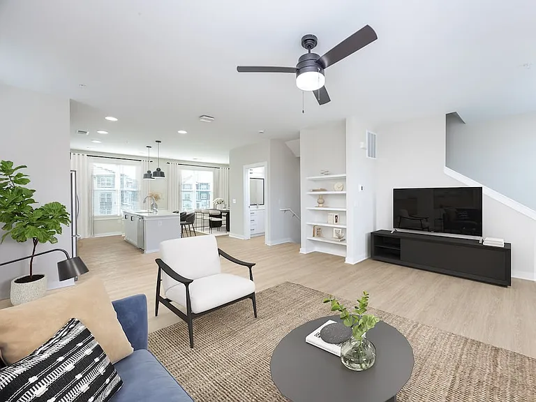 Townhome living area with built-in shelving