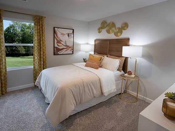 The Lennon floorplan modeled at Village at White Pine.