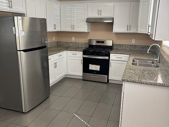 Kitchen with New Stove and Fridge