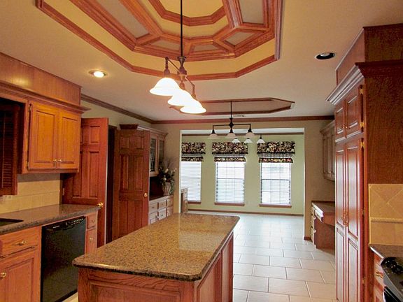 Vaulted ceilings in the kitchen and master bedrm