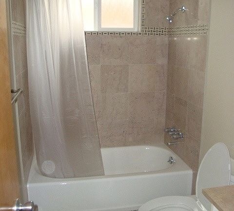 New marble bathroom with mosaic tile floor