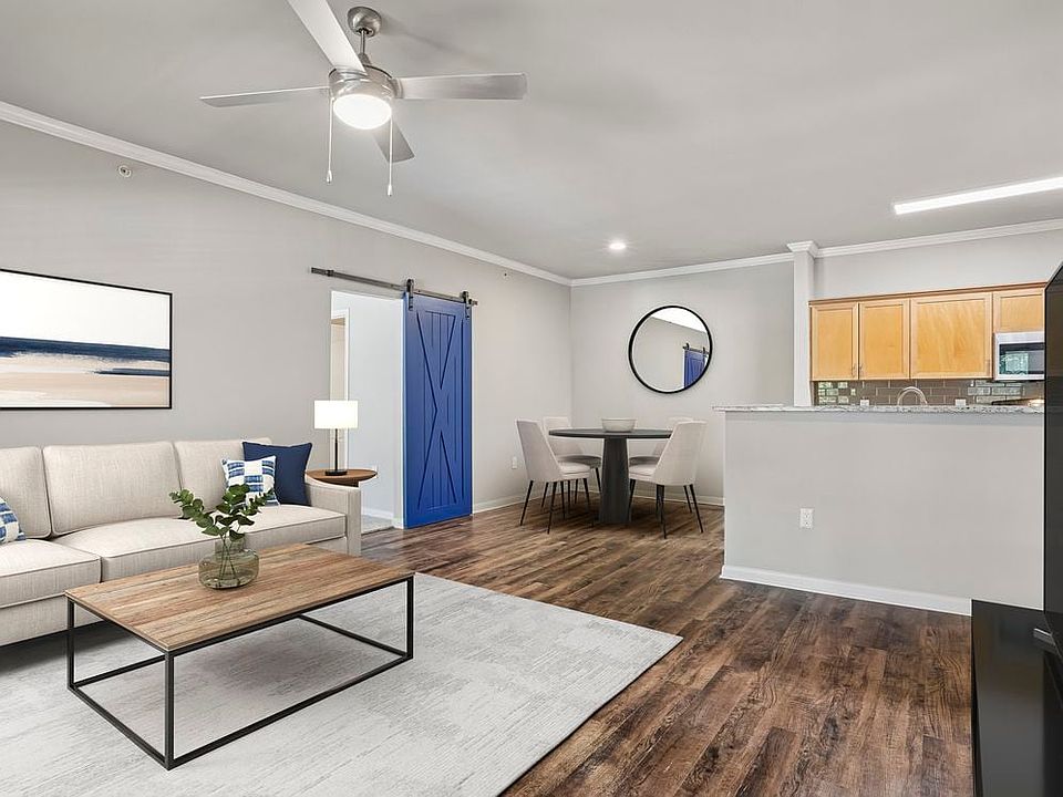 Kitchen, living, and dining area with hard surface flooring