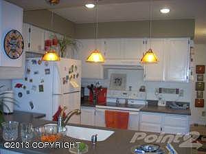 View of kitchen from dining room