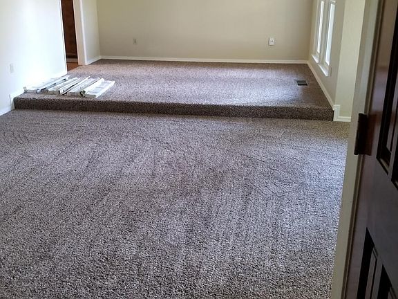 Carpeted Living Room and Formal Dining