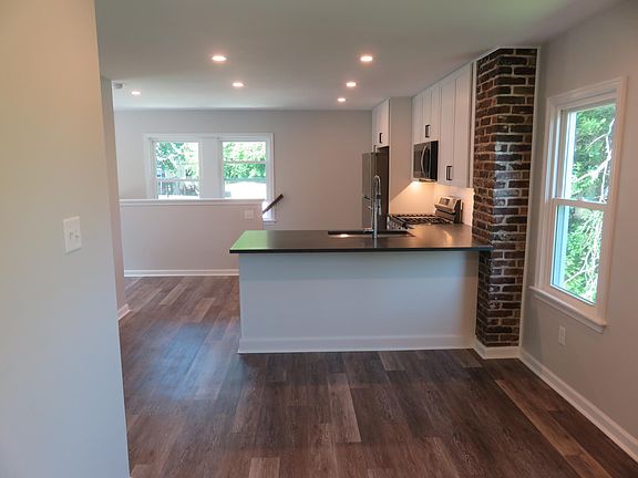 Living room looking into kitchen