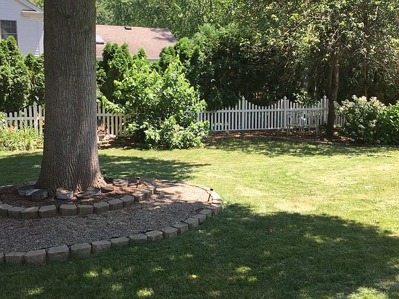 Vinyl fenced backyard.  