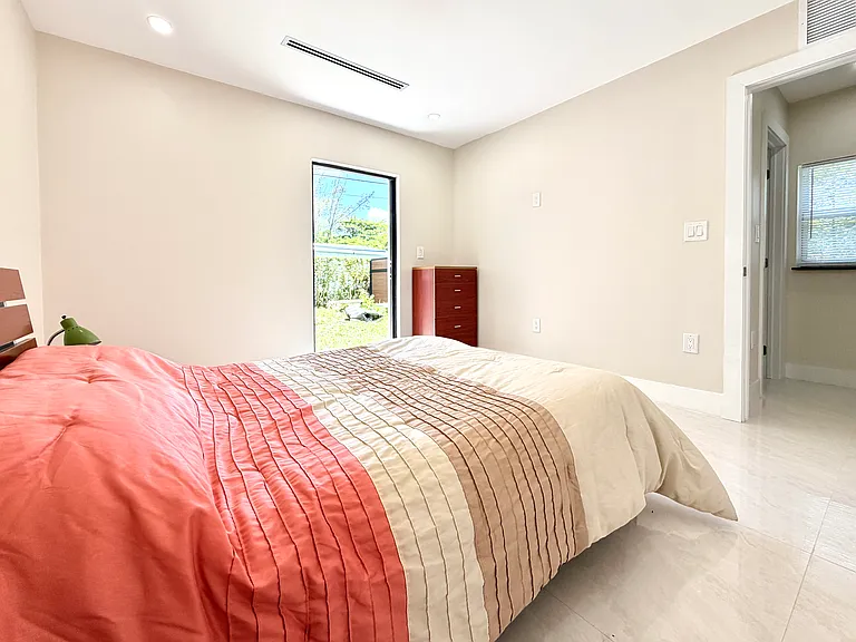 Master bedroom. Door to backyard