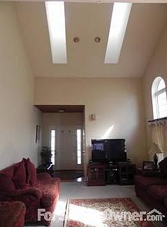 Living Room w/ Skylights