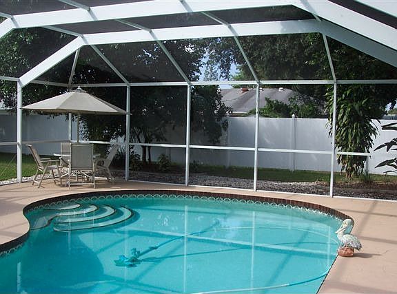 Caged Pool-Fenced Yard