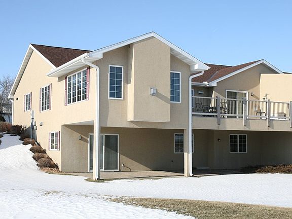 Back Side of Home, Deck and Covered Patio