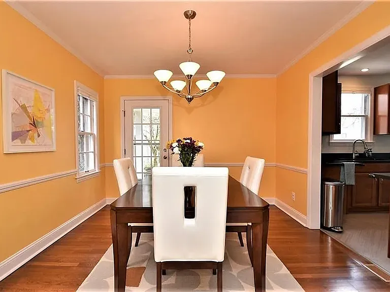 Dining room with the back door entrance