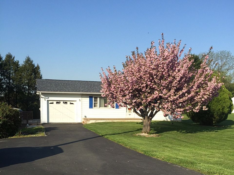 Front w/Cherry Blossom Tree in full bloom