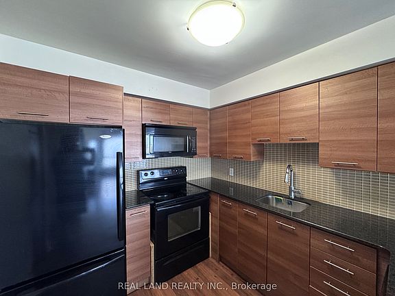 2nd image of 125 Village Green Sq #2909