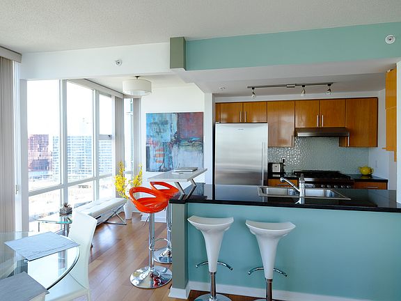 3rd image of 1077 Marinaside Cres #1906