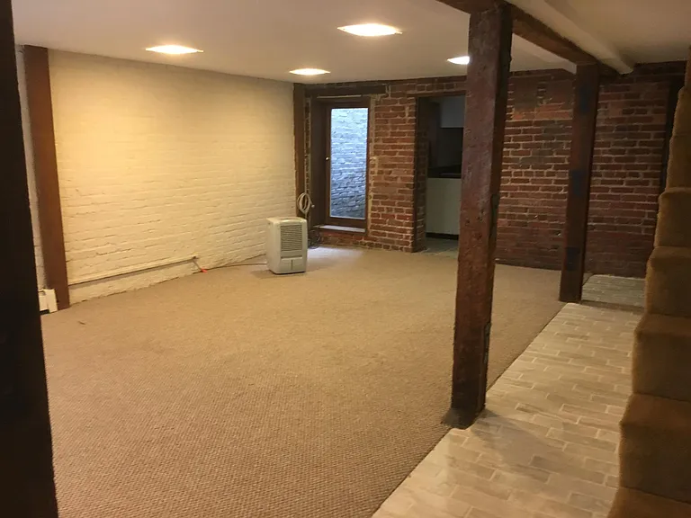 Large room. Now empty. Dehumidifier now replaced with Mini-split heat pump.