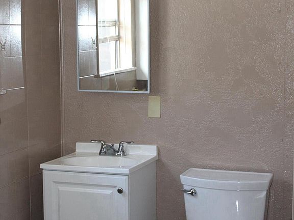 NEW CABINET AN NEW TOILET