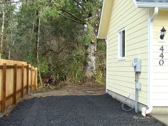 Side parking w/ room enough for an RV.