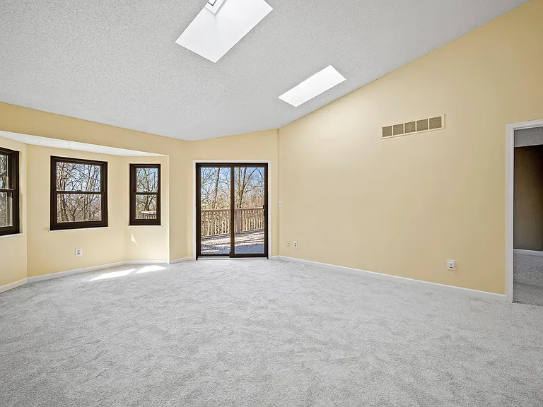Upper level living area with walk out to deck