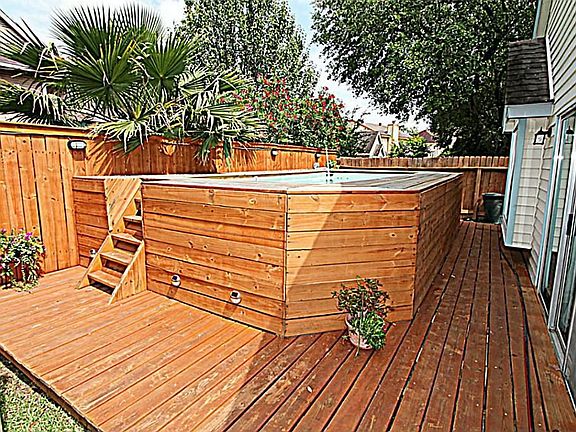 ENJOY TAKING A DIP IN THIS SPARKING POOL ON THOSE HOT SUMMER DAYS