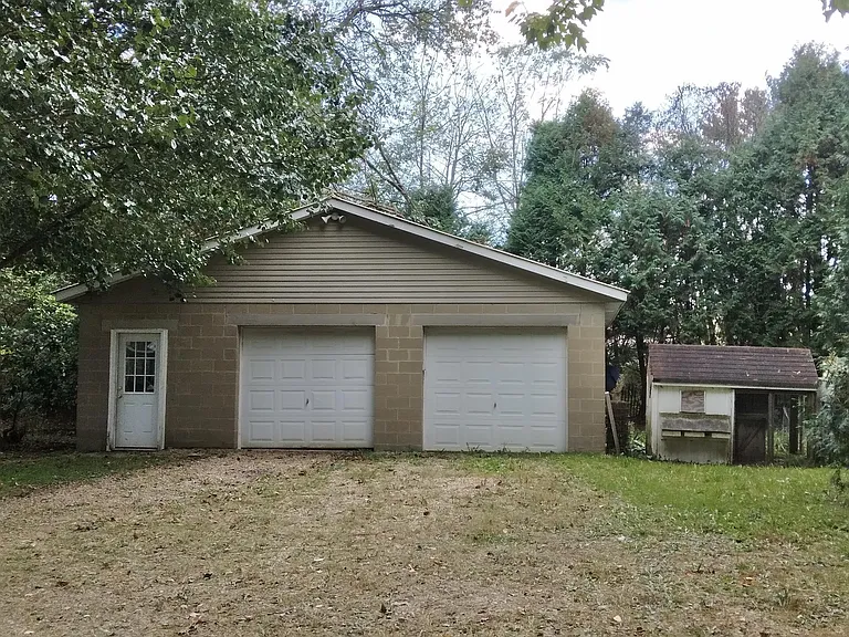 2.5 car garage and chicken coop