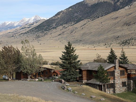 Sage Ranch Main House on right, Bunkhouse cabin on left. (Barn Apartment not seen here is just to the left.)
