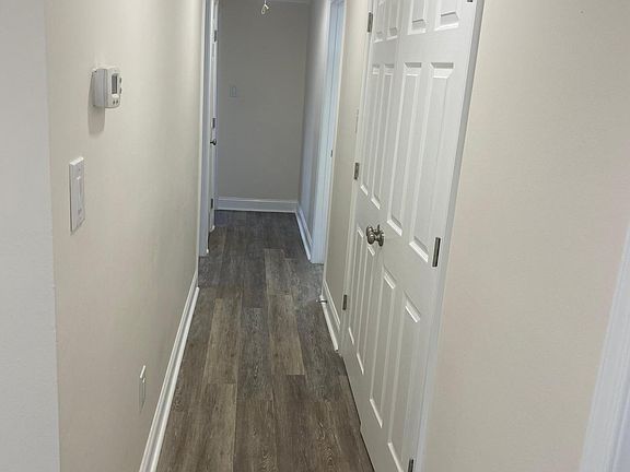 Hallway heading towards bedrooms in back.