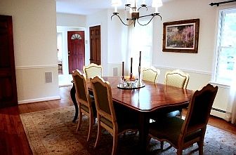 Formal dining room also has hardwood floors