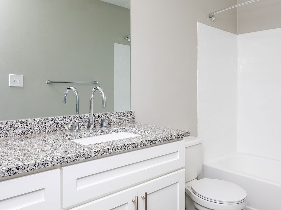 Standard Renovation with stone countertops and updated fixtures