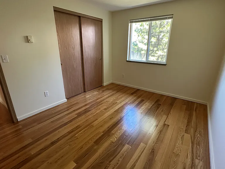 Downstairs bedroom #2, overlooks backyard.