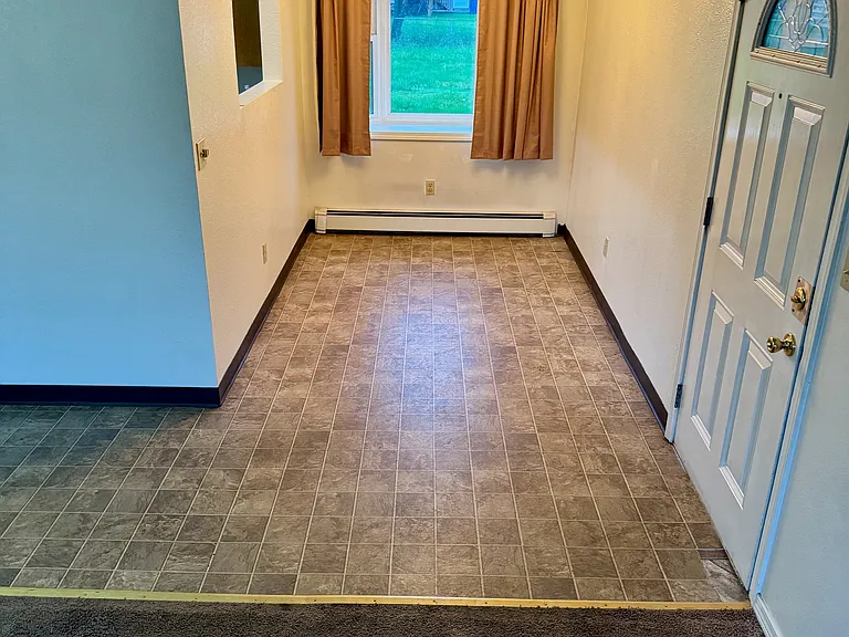 Dining room has pass-thru to kitchen.