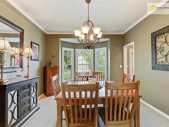 This room is currently being used as a formal dining room, but it can be an office too!