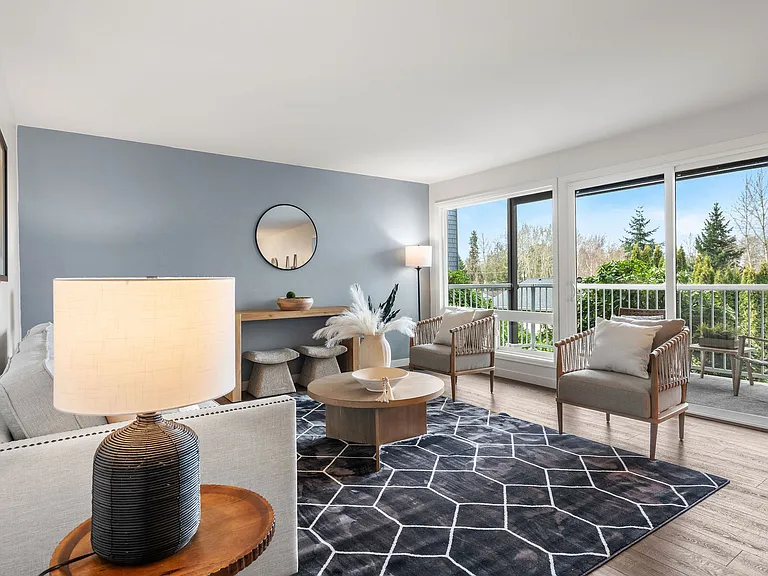 Private balcony off the living room with views of the Olympics and surrounding landscape