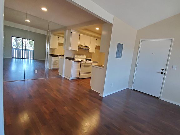 Condo interior. Pergo flooring, can lights, light and airy, high ceilings, freshly painted.