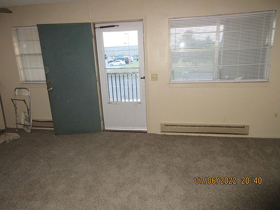 West view of Front Door and Living Room