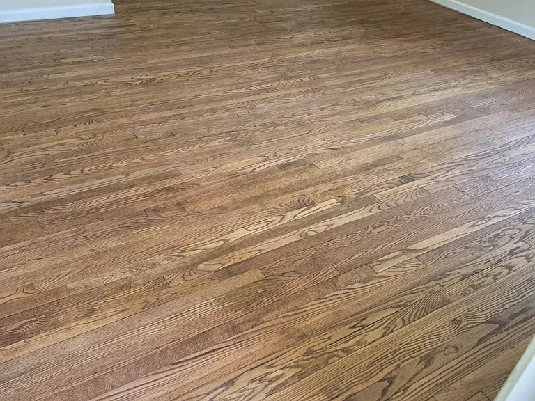 Sneak peak at the renovations with newly painted interior and refinished hardwood floor.